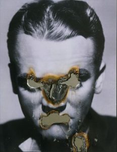 Image Credit: DOUGLAS GORDON, Self-Portrait of You + Me (James Cagney), 2006, Smoke and mirror, 30 x 27-1/2 inches (76.2 x 69.9 cm). Source: Gagosian.